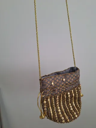 Bolso bombonera dorado y gris