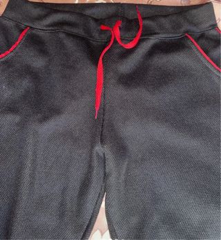 Pantaloni sportivi uomo/donna neri e rossi