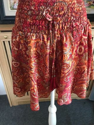 Conjunto Top Naranja y Falda pantalon.