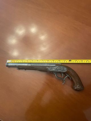 Pistola antigua decorativa