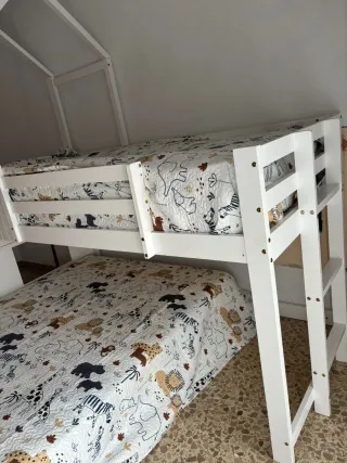 Litera con tobogán nueva a estrenar  Colchas