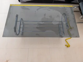 Mesa centro cristal ahumado y acero