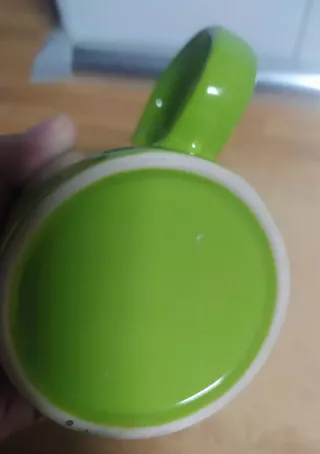 Taza verde de porcelana