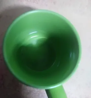 Taza verde de porcelana