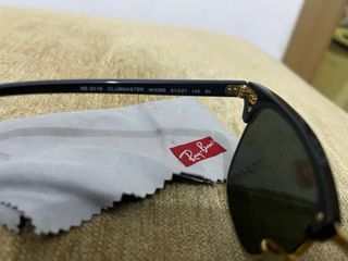 Gafas de sol Ray-Ban Clubmaster negras y doradas