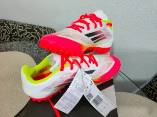 Zapatillas multitacos Adidas blancas y rosas para