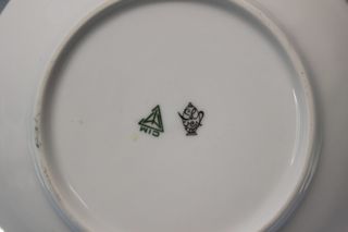 Cenicero decorado a mano con oro de ley.