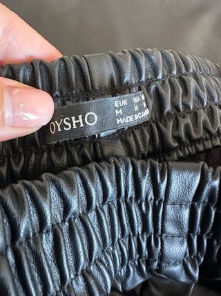 Pantalones Palazzo Eco-piel Oysho Negros