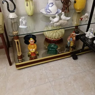 Mesa centro dorada cristal y metal