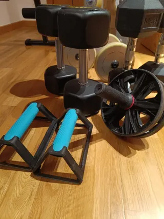 Banco de pesas + mancuernas y discos