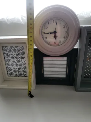 Portafoto con orologio