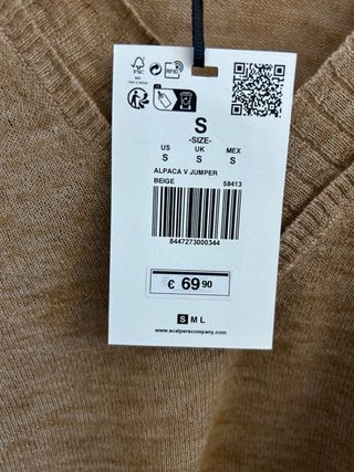 Jersey Scalpers cuello pico beige talla S