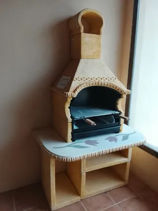 Barbacoa de terracota y metal