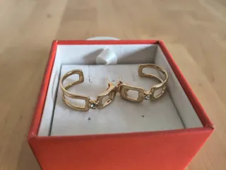 Pendientes UNOde50 Bañados en Oro 18k