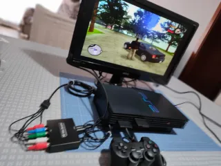 PS2 Nera con Hard Disk e molti accessori