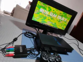 PS2 Nera con Hard Disk e molti accessori