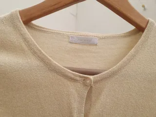 Chaqueta punto niña dorada