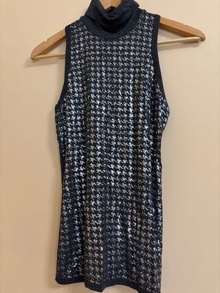 Blusa sin mangas cuello alto estampado