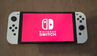 Nintendo Switch OLED + Mario Kart + Volantes