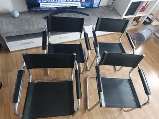 Poltrone in pelle e metallo di design