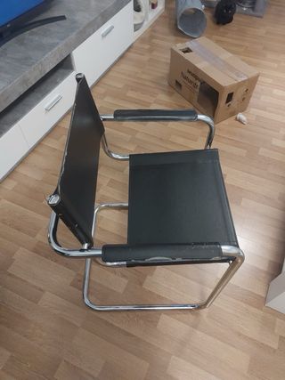 Poltrone in pelle e metallo di design