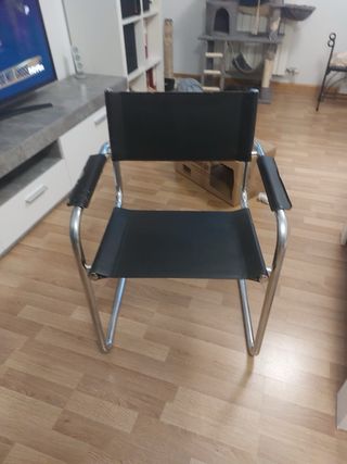 Poltrone in pelle e metallo di design