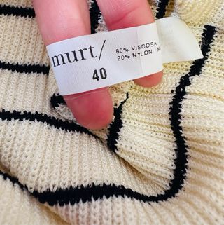 Jersey de punto beige y negro