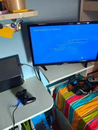 PS4 Fat con controller e 4 giochi