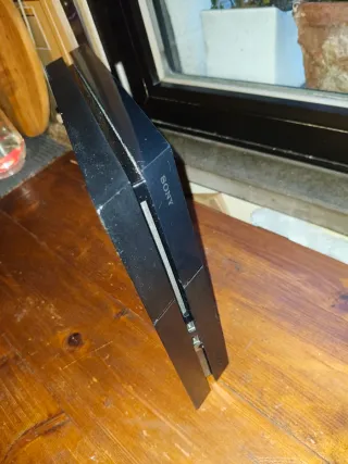 PS4 Fat con controller e 4 giochi