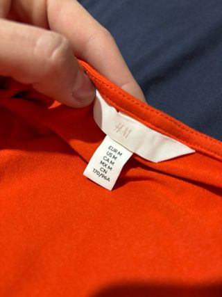 Body manga larga escote pico naranja