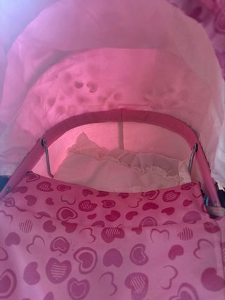 Carrito de muñecas rosa