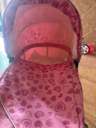 Carrito de muñecas rosa