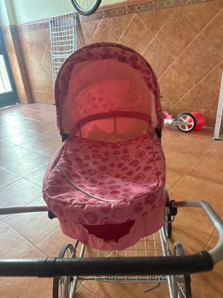 Carrito de muñecas rosa