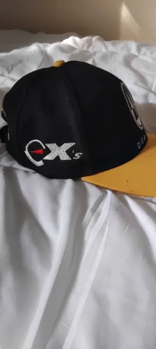 Gorra ROSSIGNOL negra y amarilla