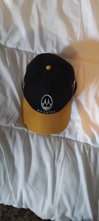 Gorra ROSSIGNOL negra y amarilla