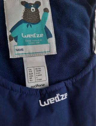 Mono de nieve infantil azul y blanco