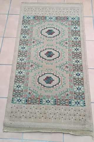 Tappeto antico in lana fatto a mano