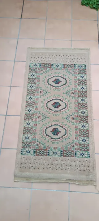 Tappeto antico in lana fatto a mano