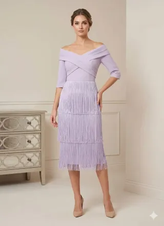 Vestido Juan Bernal escote bardot flecos