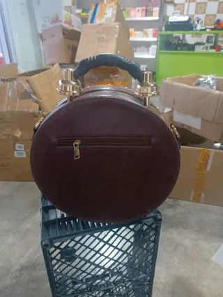 Bolso estilo reloj vintage