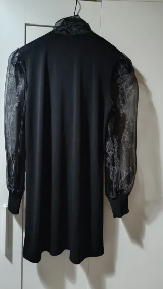 Abito elegante nero con fiocco