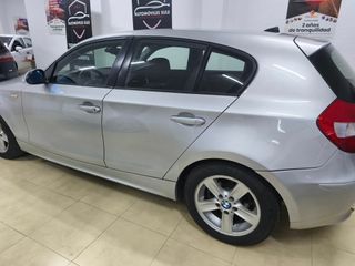 BMW Serie 118i. 160.000km garantia y transferencia