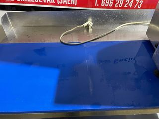 Mesa de acero inoxidable con tabla para carnicería