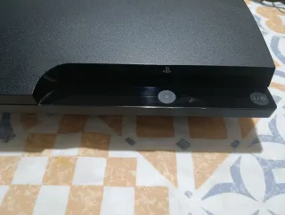 PS3 Sony con 10 juegos y mando