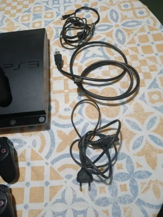 PS3 Sony con 10 juegos y mando