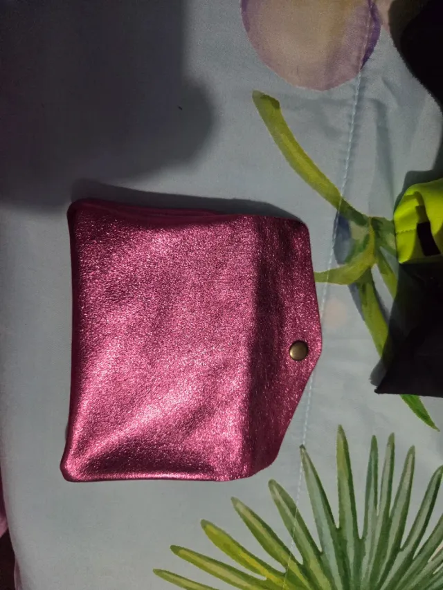 Cartera rosa brillante