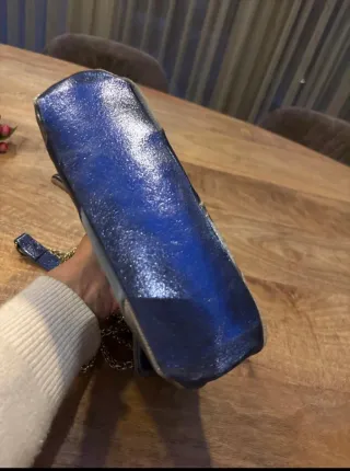 Bolso de piel patchwork. Asa de cadena y piel.