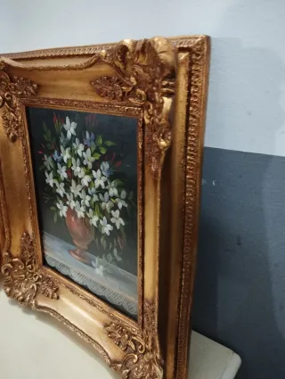 Pareja de óleos florales marco dorado