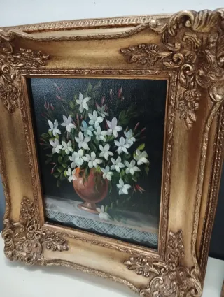 Pareja de óleos florales marco dorado