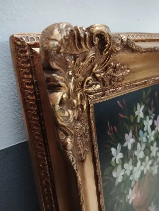 Pareja de óleos florales marco dorado